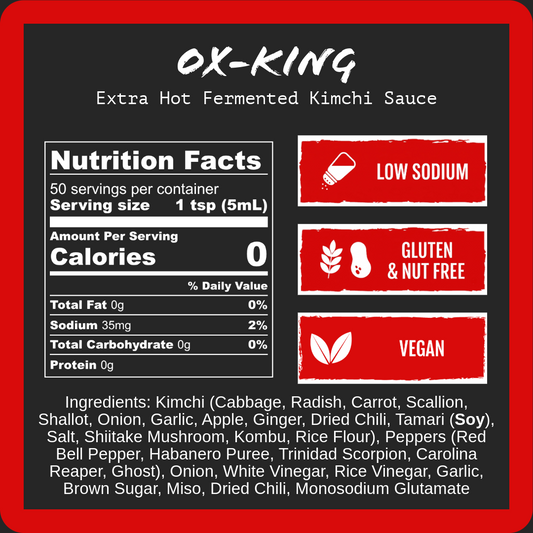 Front of an OX-KING Extra Hot Fermented Kimchi Sauce label, showing nutrition facts, three red feature badges for low sodium, gluten & nut free, and vegan, and a list of ingredients on a black background with a red border.