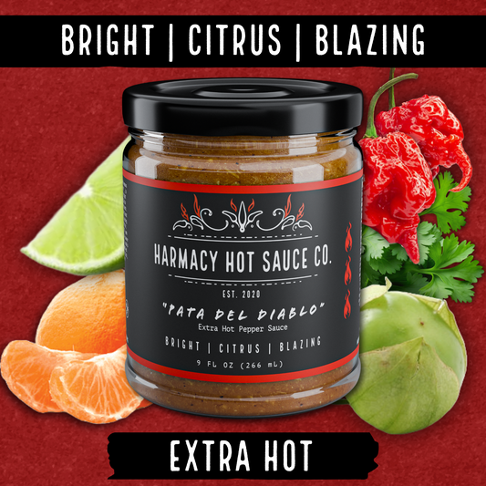 Hot sauce jar with ingredients on a red background